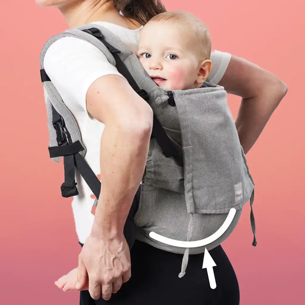 The Stokke Limas Baby Carrier combines the benefits of a wrap with ergonomic support, made from soft organic cotton and supporting babies from 7 lbs to 33 lbs.