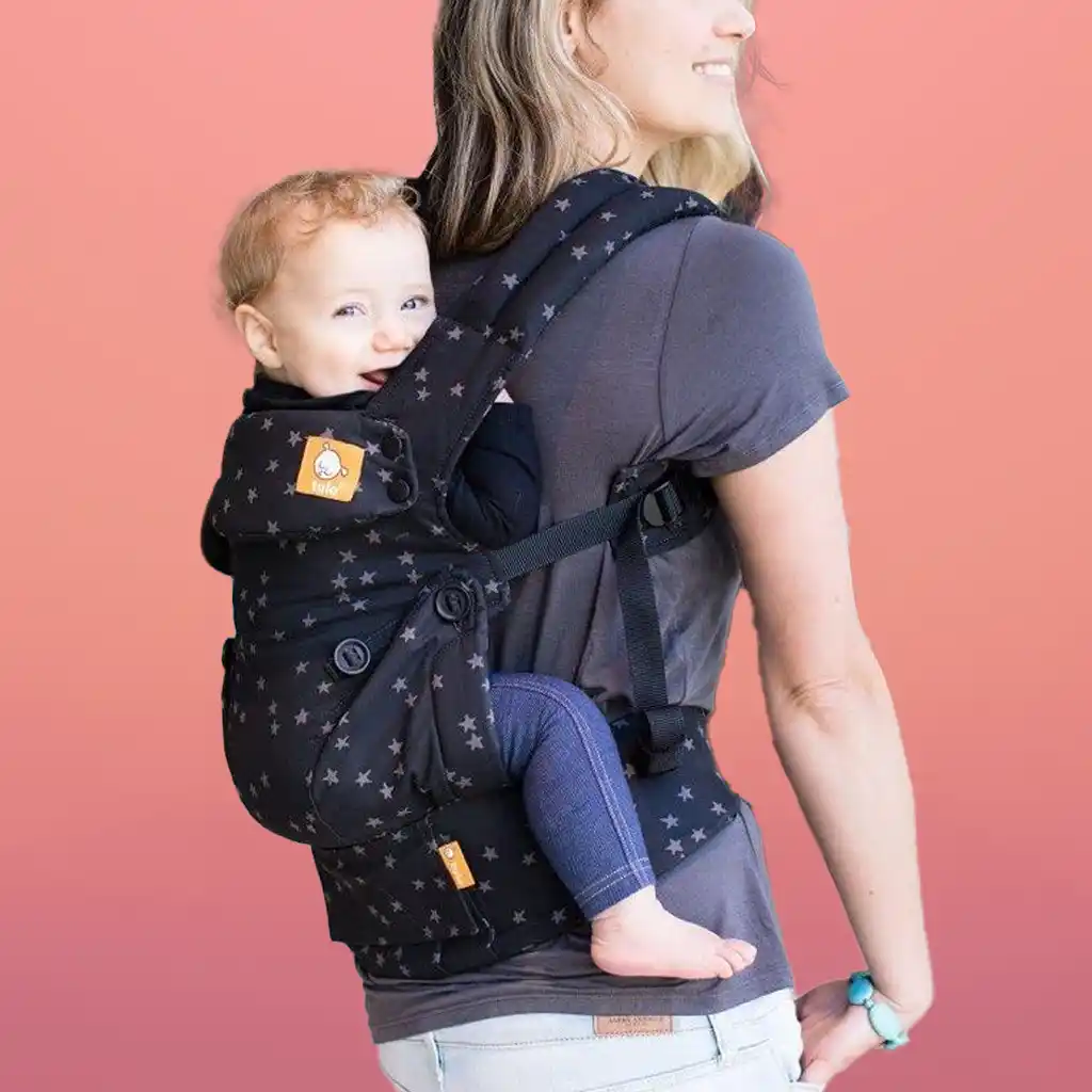 The Tula Free-to-Grow Baby Carrier features an adjustable body panel for a customized fit from newborn to toddler, supporting babies from 7 lbs to 45 lbs.