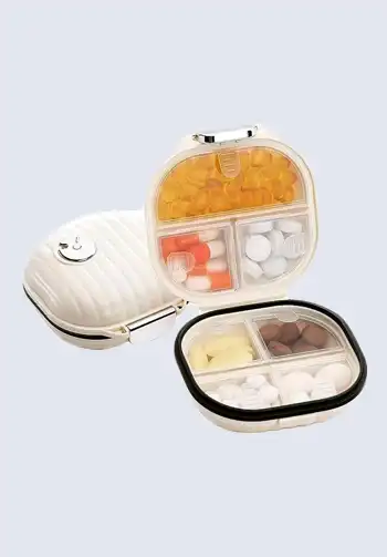 A portable pill organizer designed for travel, helping you keep your medications neatly sorted and easily accessible during your journey.