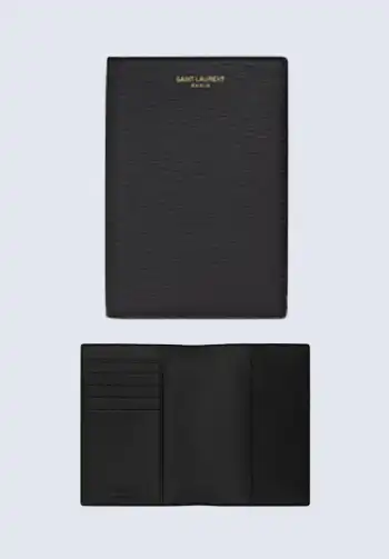 A sleek black passport holder from Saint Laurent Paris, showcasing luxury and sophistication for the discerning traveler.