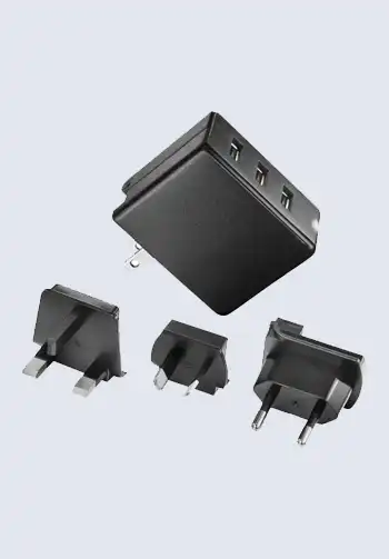 A compact travel plug adapter set, ideal for international travel, ensuring compatibility with different types of power outlets around the world.