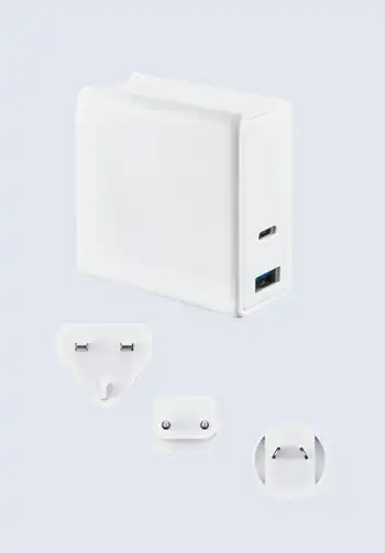 A travel plug adapter equipped with USB ports, allowing you to charge multiple devices simultaneously while traveling internationally.