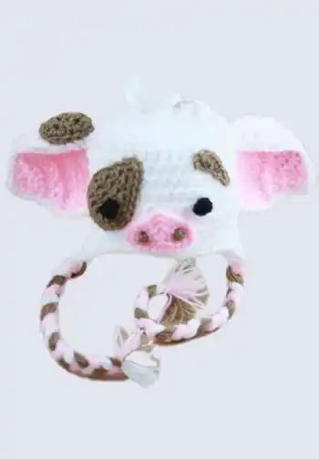 An adorable little hat for newborns, designed to look like Pua from Moana, perfect for a cute and comfortable newborn Halloween costume.