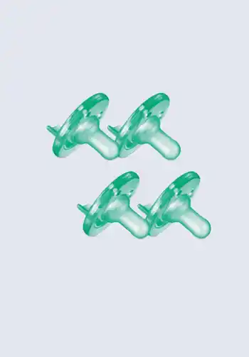 A set of green soothie pacifiers, perfect for soothing and comforting your baby, essential for keeping in your diaper bag.