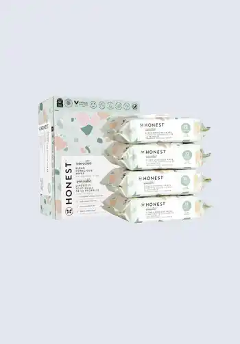 A box of The Honest Company baby wipes, plant-based and hypoallergenic, with 10 packs, great for your diaper bag