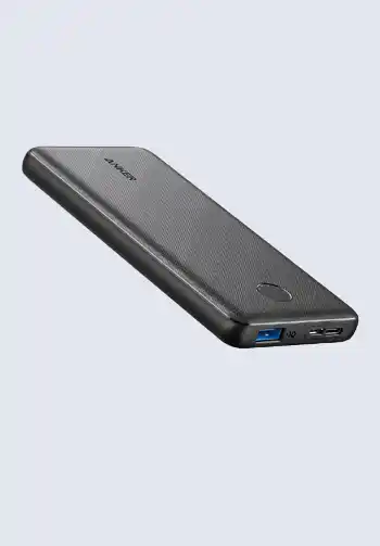 An Anker power bank, providing portable charging for multiple devices, ideal for a hospital bag for labor to ensure devices stay powered during extended hospital stays.