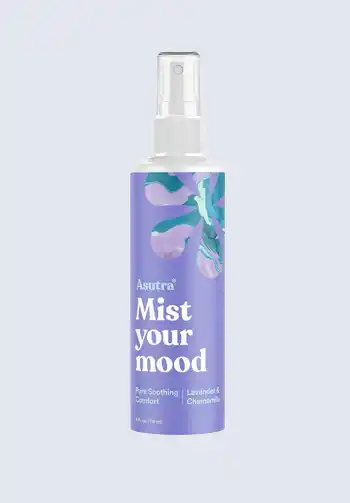 A bottle of Asutra Mist Your Mood spray, infused with lavender and chamomile, essential for creating a calming environment during labor, ideal for a hospital bag for labor.