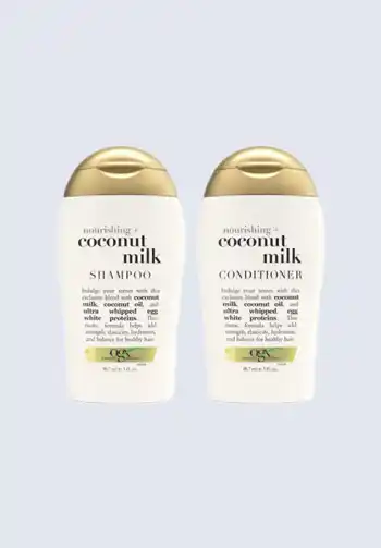 Bottles of OGX Coconut Milk shampoo and conditioner, offering nourishing and strengthening benefits, an essential item for a hospital bag list for birth.