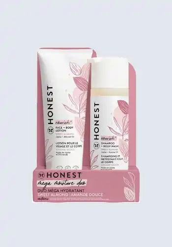 A set of Honest Mega Moisture shampoo and conditioner, providing gentle and effective cleansing for all hair types, making it a necessary addition to a hospital bag for delivery list.