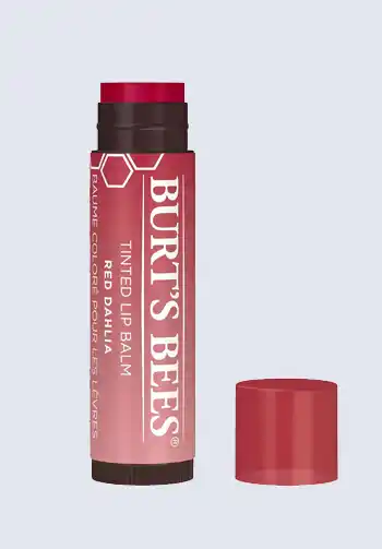 A stick of Burt's Bees tinted lip balm, providing hydration and a hint of color, an essential item for a hospital bag list for birth.