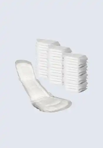 A stack of maternity pads, necessary for managing heavy postpartum bleeding, making them a vital addition to a hospital bag for delivery list.