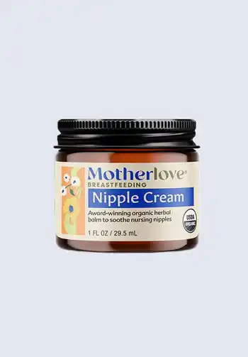 A jar of Motherlove nipple cream, made with organic herbs to nourish and protect nursing nipples, essential for a hospital bag for labor.