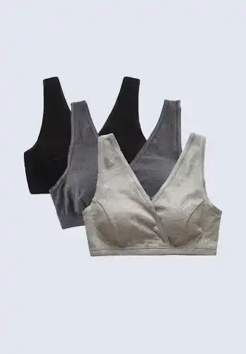 A collection of grey and black comfortable nursing bras, perfect for postpartum wear and breastfeeding, a must-have for a hospital bag for mom.