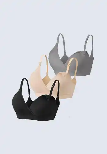 A selection of nursing bras in neutral colors, ideal for supporting breastfeeding mothers during labor and postpartum, essential for a hospital bag for labor.