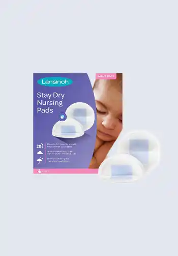 A box of Lansinoh Stay Dry nursing pads, designed to keep nursing mothers comfortable and dry, making them a necessary addition to a hospital bag for delivery list.