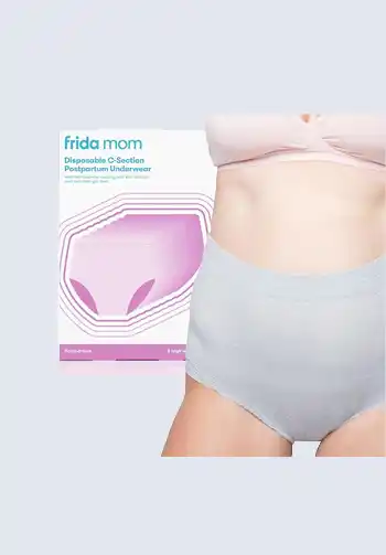 A package of Frida Mom high-waisted disposable underwear, offering full coverage and support for postpartum recovery, making it a necessary addition to a hospital bag for delivery list.