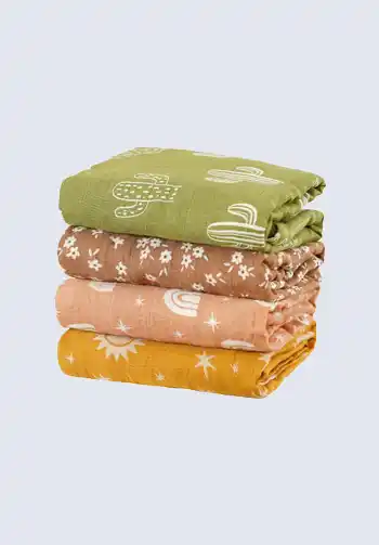 A collection of printed muslin swaddle blankets, providing extra comfort and style for your newborn. Make sure to include these in your hospital bag checklist.