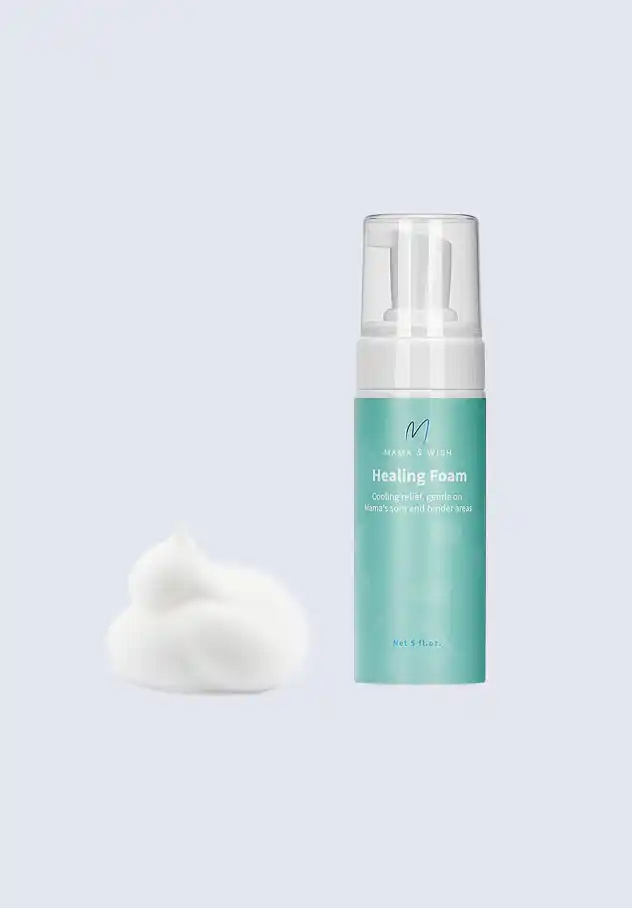 Mama & Wish healing foam, designed to soothe and promote healing in the perineal area during postpartum recovery, a key component of the postpartum essentials kit.