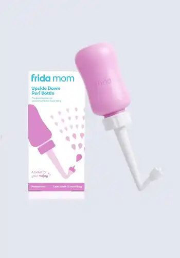 Frida Mom upside-down peri bottle, designed for easy and gentle postpartum cleansing, a vital part of the Frida Mom Postpartum Essentials Kit.