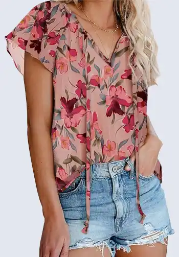 Add a touch of femininity to your soccer mom attire with this floral print peasant blouse. Its lightweight fabric and flowy design make it perfect for warm weather. Pair it with denim shorts or jeans for a chic and comfortable soccer mom outfit.