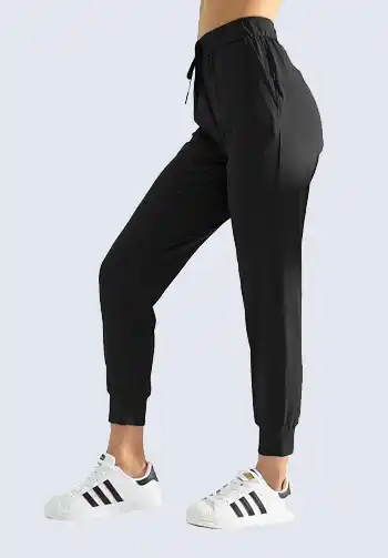 These black high-waisted joggers are a staple for the sporty chic soccer mom attire. Offering a sleek and comfortable fit, they are perfect for an active day on the sidelines. Pair them with a fitted top and stylish sneakers for a complete soccer mom outfit.