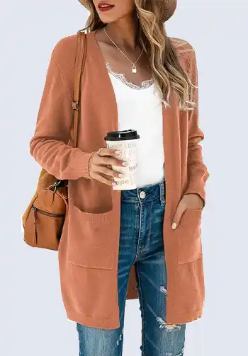 This rust brown open-front cardigan adds a pop of color and warmth to your soccer mom wear. Its relaxed fit and soft material make it a great layering piece for cooler game days. Pair it with a simple top and distressed jeans for a casual yet stylish look.