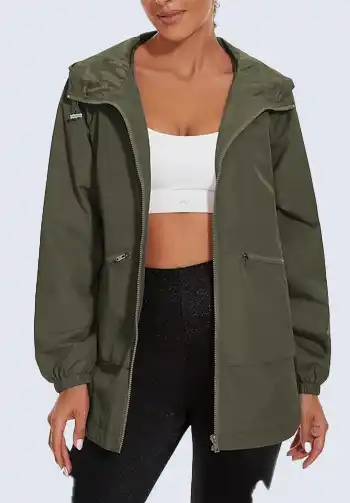 This olive green waterproof jacket is essential for soccer moms facing unpredictable weather. Its durable material and stylish design ensure you stay dry and comfortable during rainy game days. Layer it over your favorite activewear for a practical and fashionable soccer mom outfit.