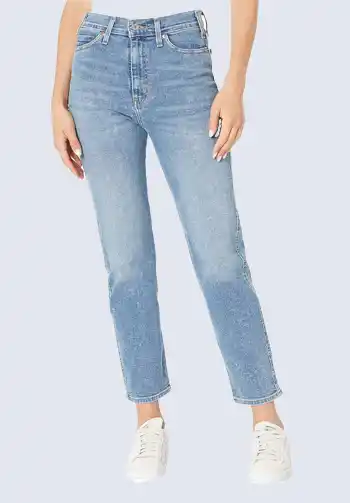 These light blue straight-leg jeans provide a casual and comfortable option for soccer mom attire. Their classic fit and versatile style make them perfect for pairing with any top or jacket. Great for a relaxed yet stylish look on game days.