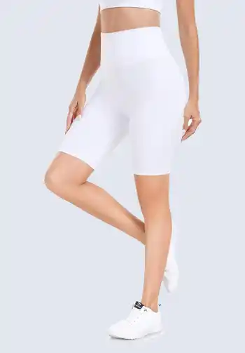 These white bike shorts are a stylish and practical choice for soccer moms who prioritize comfort. Their fresh, minimalist look pairs well with any top, making them versatile for various outfit combinations. Perfect for warm days on the field, these shorts keep you looking fresh and feeling great.