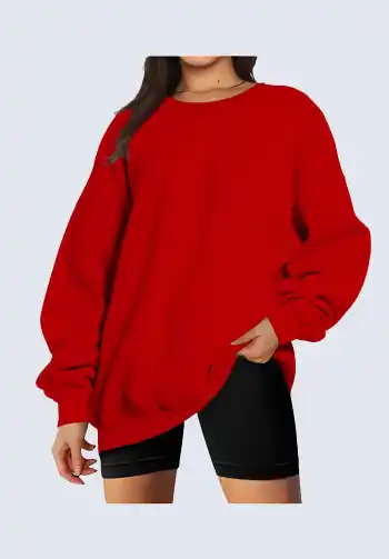 This cozy red oversized sweatshirt is a standout piece for the classic comfort soccer mom outfit. Perfect for cooler game days, it offers warmth and a pop of color to show team spirit. Pair it with black leggings or bike shorts for a stylish and practical soccer mom wear.