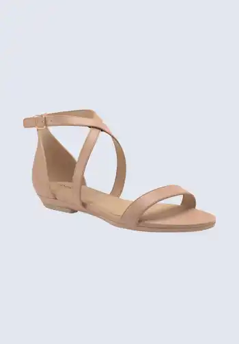 Stay cool and stylish with these neutral ankle strap sandals, perfect for warm weather soccer games. Their sleek design and comfortable fit make them an ideal addition to any soccer mom outfit. Pair them with shorts or a casual dress for a fashionable and functional look.