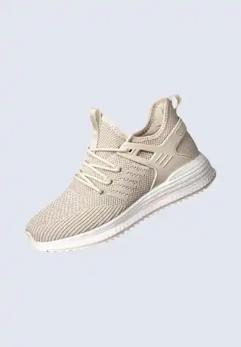 Stay trendy and comfortable with these beige athletic knit sneakers, perfect for soccer mom attire. Their breathable material and supportive fit make them ideal for long hours on the field. Pair them with leggings or an oversized sweatshirt for a complete and stylish soccer mom look.