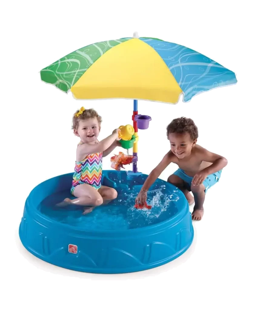 Step2 Play and Shade Pool with two children playing, featuring a colorful umbrella and water toys.