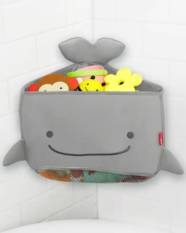 A whale-shaped bath toy organizer with a mesh pocket, filled with various bath toys, providing a fun and functional storage solution for bath time.