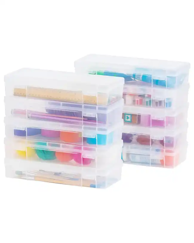 A set of stackable clear storage boxes filled with various small craft supplies, providing a compact and organized storage solution.