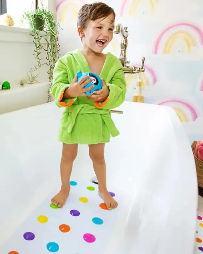 Munchkin dots bath mat for colorful and safe baby bath time