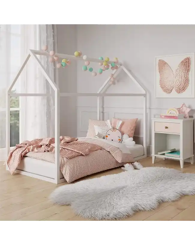 A beautifully designed Montessori floor bed featuring a house-shaped frame adorned with colorful string lights. The toddler floor bed has a white wooden frame with a low profile, promoting independence for young children. The cozy setup includes soft bedding in pastel colors and decorative pillows, creating a warm and inviting sleep environment. The room is styled with a fluffy rug and playful wall art, making it a perfect space for both rest and imaginative play.






A beautifully designed Montessori floor bed featuring a house-shaped frame adorned with colorful string lights. The toddler floor bed has a white wooden frame with a low profile, promoting independence for young children. The cozy setup includes soft bedding in pastel colors and decorative pillows, creating a warm and inviting sleep environment. The room is styled with a fluffy rug and playful wall art, making it a perfect space for both rest and imaginative play.