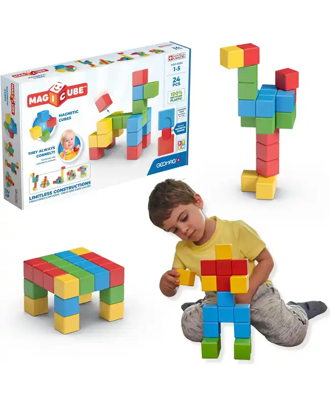 A set of colorful magnetic building blocks being used by a toddler to create various structures, encouraging creativity and fine motor skills, ideal for Montessori toys for 1 year olds.