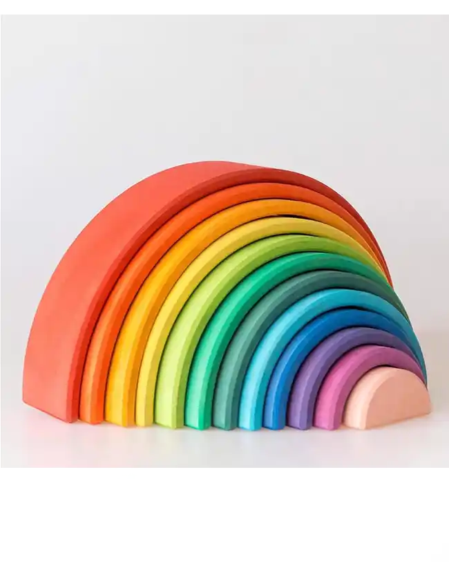 A colorful wooden Montessori rainbow stacker, perfect Montessori toys for 2 year olds to enhance creativity and fine motor skills.