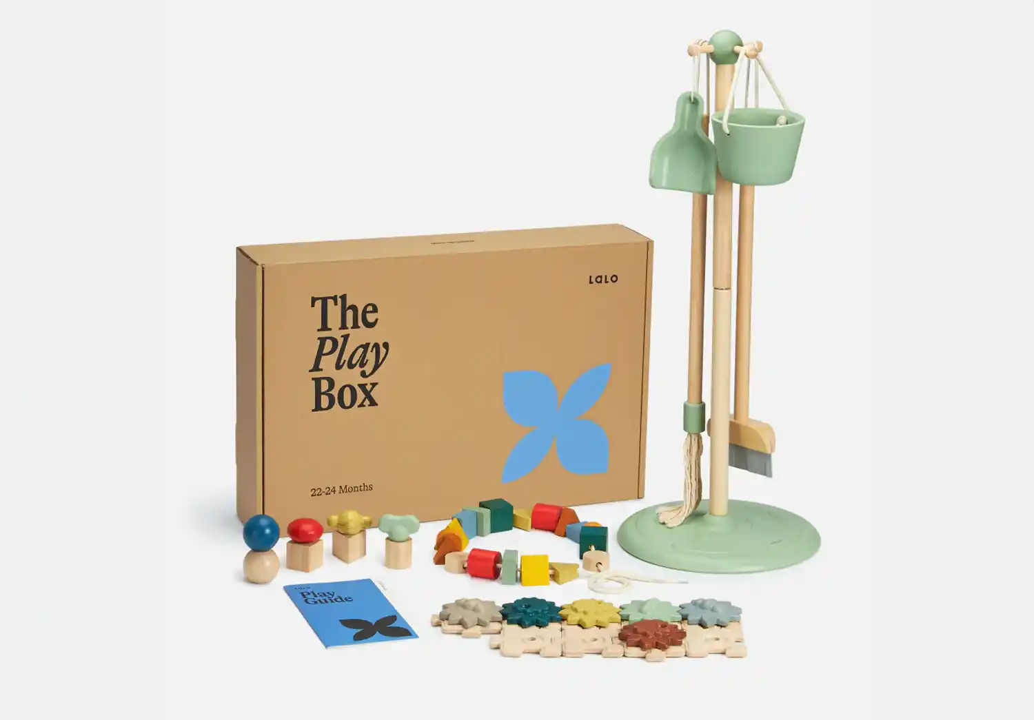 Lalo's The Play Box for 2 year olds, containing Montessori-inspired toys and activities to support cognitive and motor skill development.