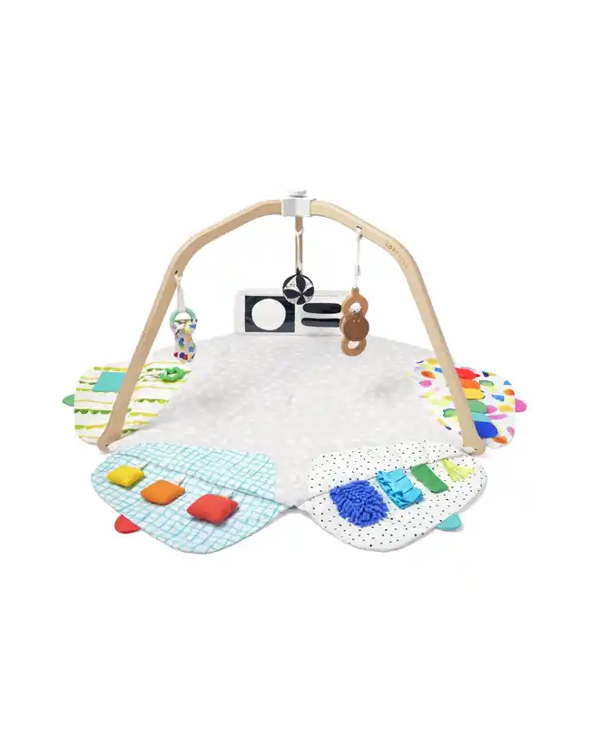 Lovevery The Play Gym with various sensory activities, perfect for tummy time infants and engaging tummy time toys.