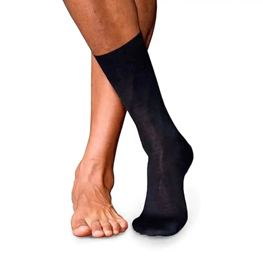 A pair of black silk socks displayed on feet, a comfortable and stylish 12-Year Anniversary Gift idea.