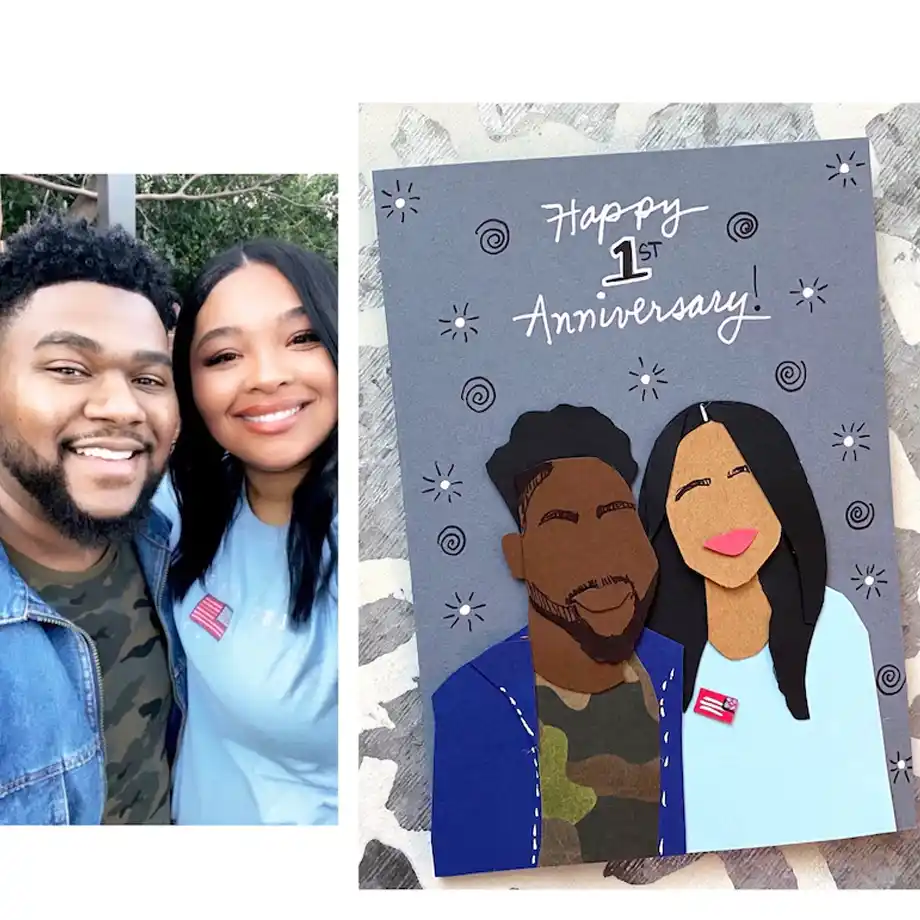 A happy couple smiling in a photo next to a handmade 1st anniversary card featuring their illustrated portrait, offering inspiration for anniversary quotes for a wife and personalized gift ideas.