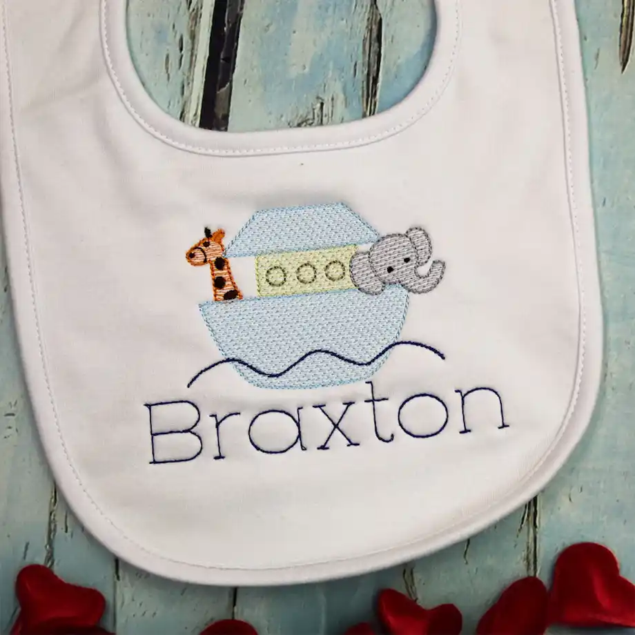 Soft and stylish personalized baby bib, perfect for keeping little ones clean in a cute and custom way. A thoughtful and practical baby shower gift idea that adds a personal touch to mealtime.