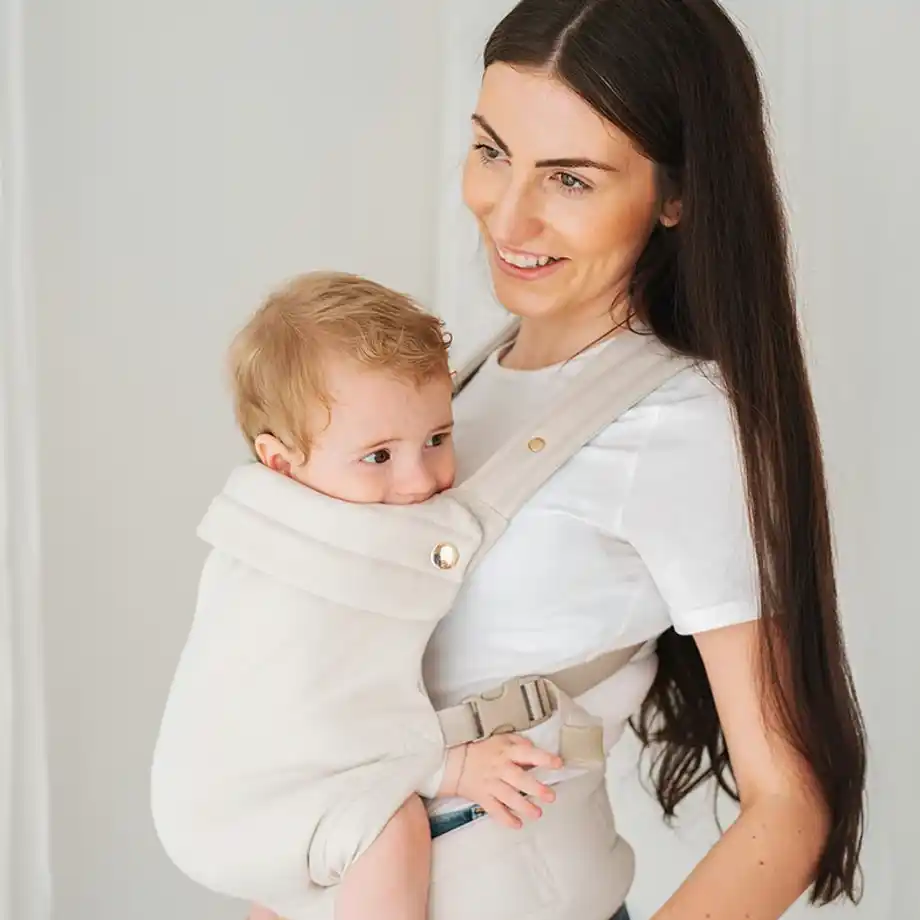 Soft and stylish Baby Carrier in Calico Cream, offering comfort and support for both parent and baby. A perfect and practical baby shower gift idea for new parents seeking a hands-free solution.