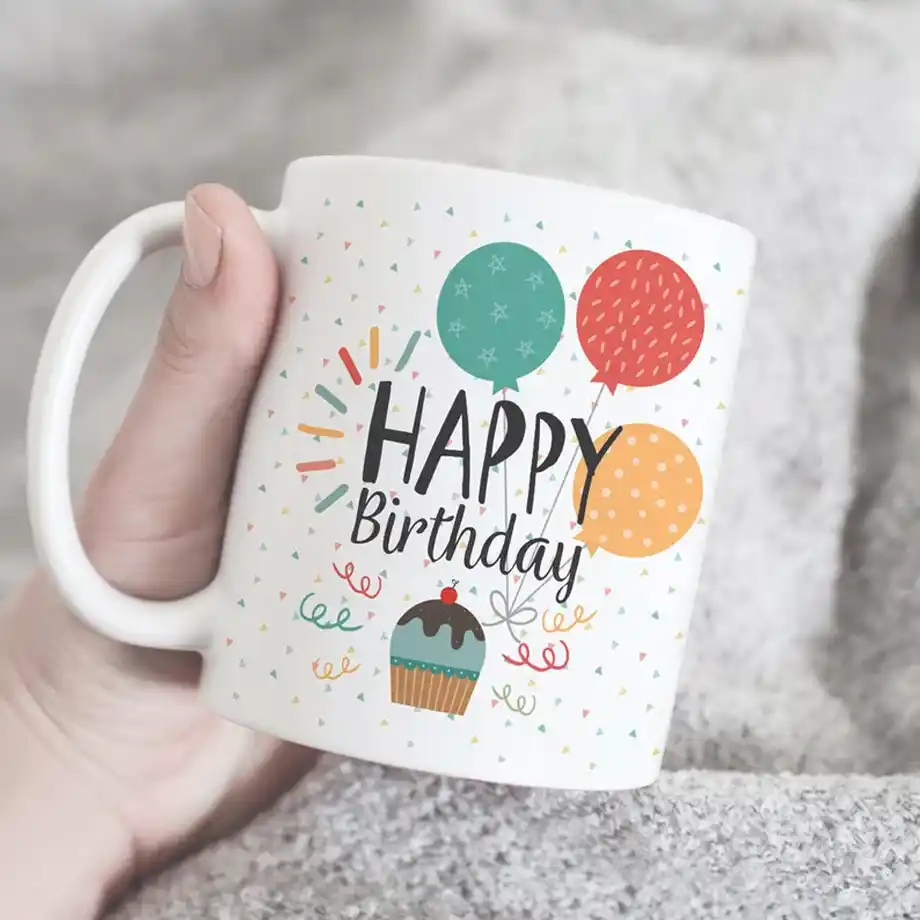 A colorful and cheerful 'Happy Birthday' coffee mug, ideal for sending warm Birthday Wishes for Daughter and making her special day even more memorable.