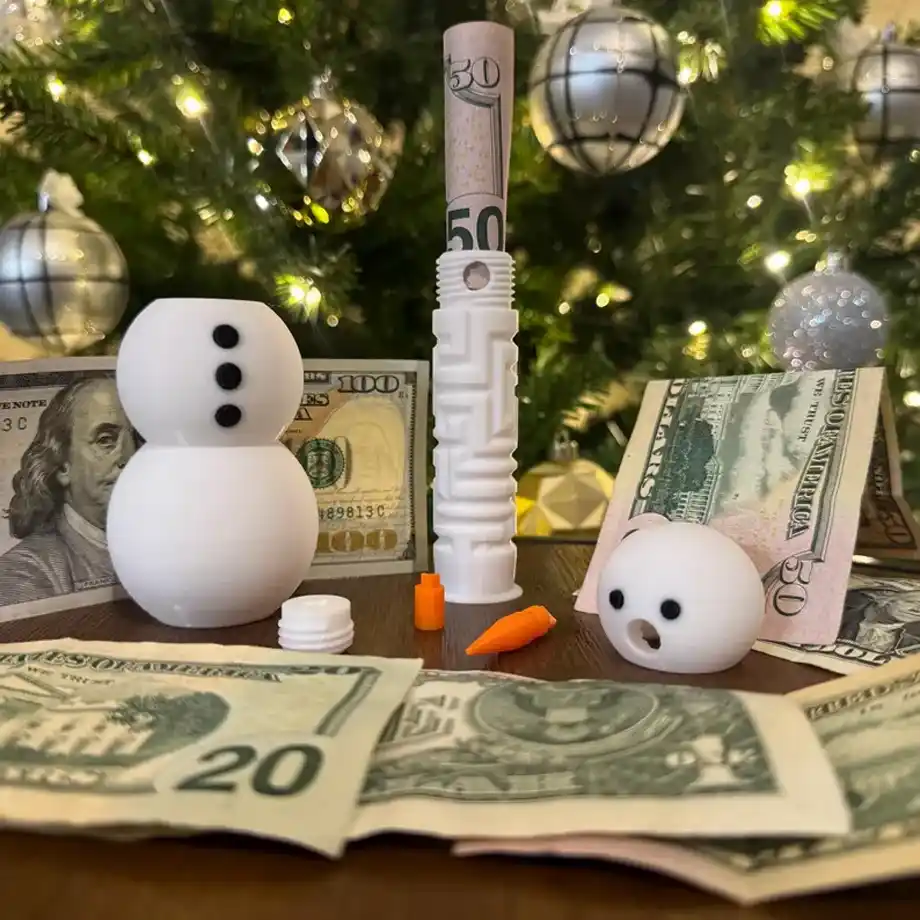 The Snowman Puzzle Gift Box is a 3D-printed, interactive way to gift money, making it a fun and unique option for the holidays. Perfect for those looking for fun ways to gift money in a memorable and festive way.