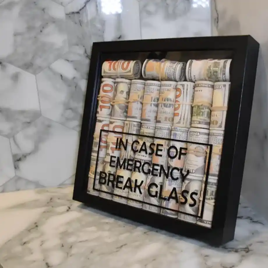 This luxury blacked-out money canvas is a unique and stylish way to gift money. With a sleek, modern design, it turns cash into a work of art, making it a perfect gift for any occasion. Discover fun ways to gift money with this sophisticated and creative gift idea that’s sure to impress!