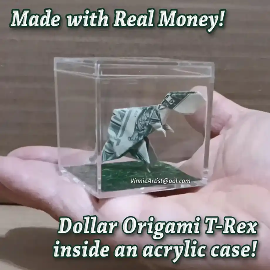 A unique and creative way to gift money featuring a T-Rex crafted from a folded dollar bill, displayed inside a sleek acrylic case. Perfect for dinosaur enthusiasts or anyone who appreciates intricate origami, making it a memorable and fun way to gift money.






