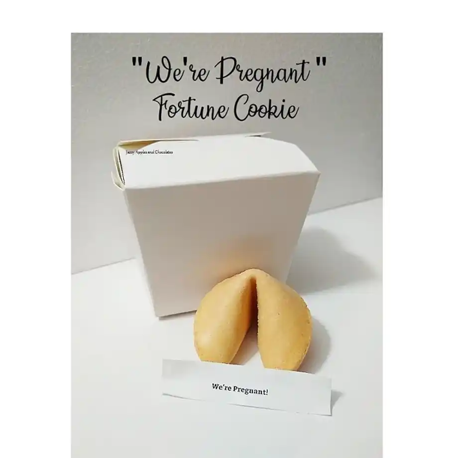 Reveal your pregnancy with a fun twist using this pregnancy announcement fortune cookie. A unique and creative way to share the big news, perfect for those looking for memorable pregnancy announcement ideas.